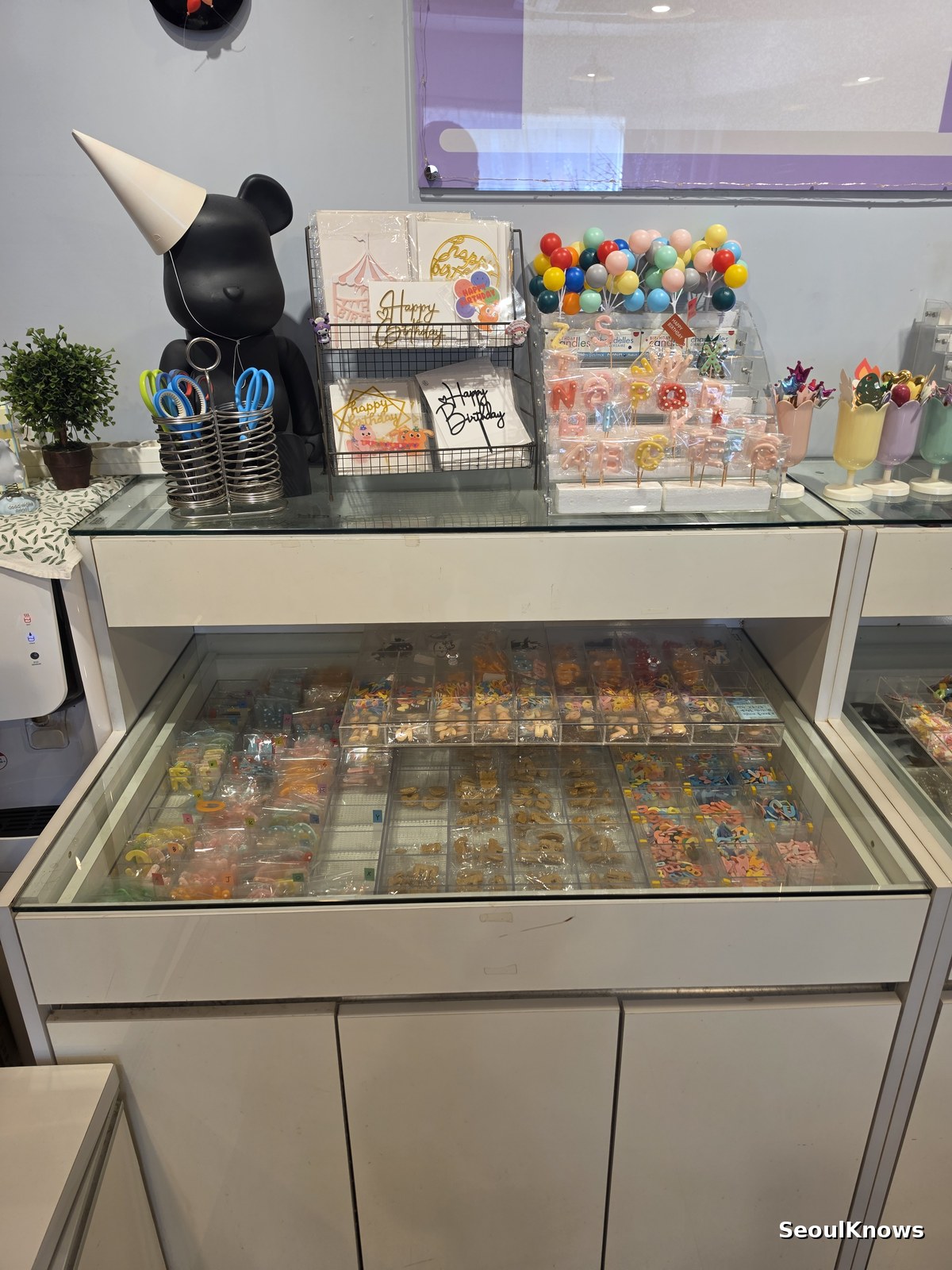 Cake decoration counter with miniature figures in Seoul