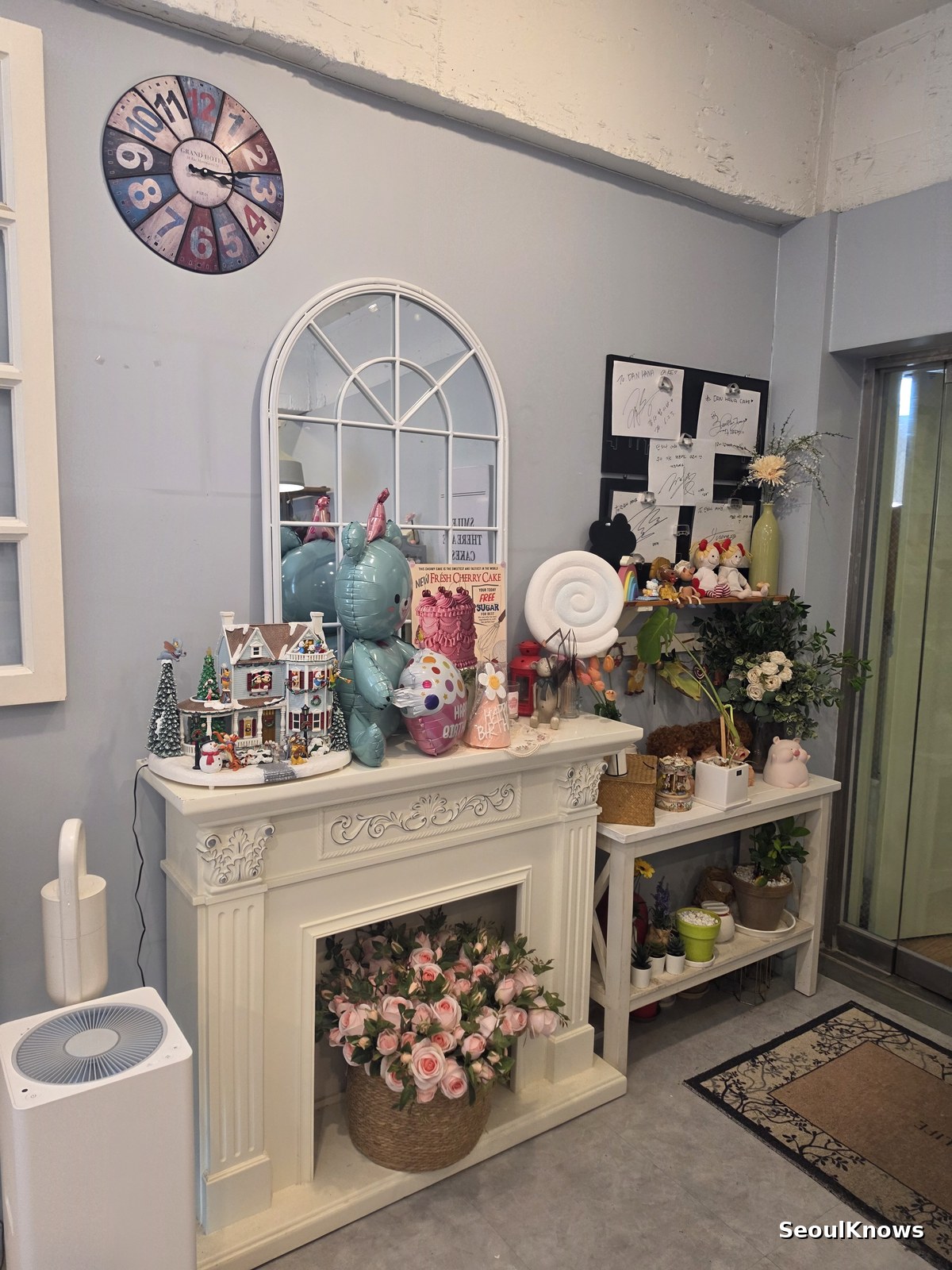 Interior of a custom cake studio in Seoul with display shelves