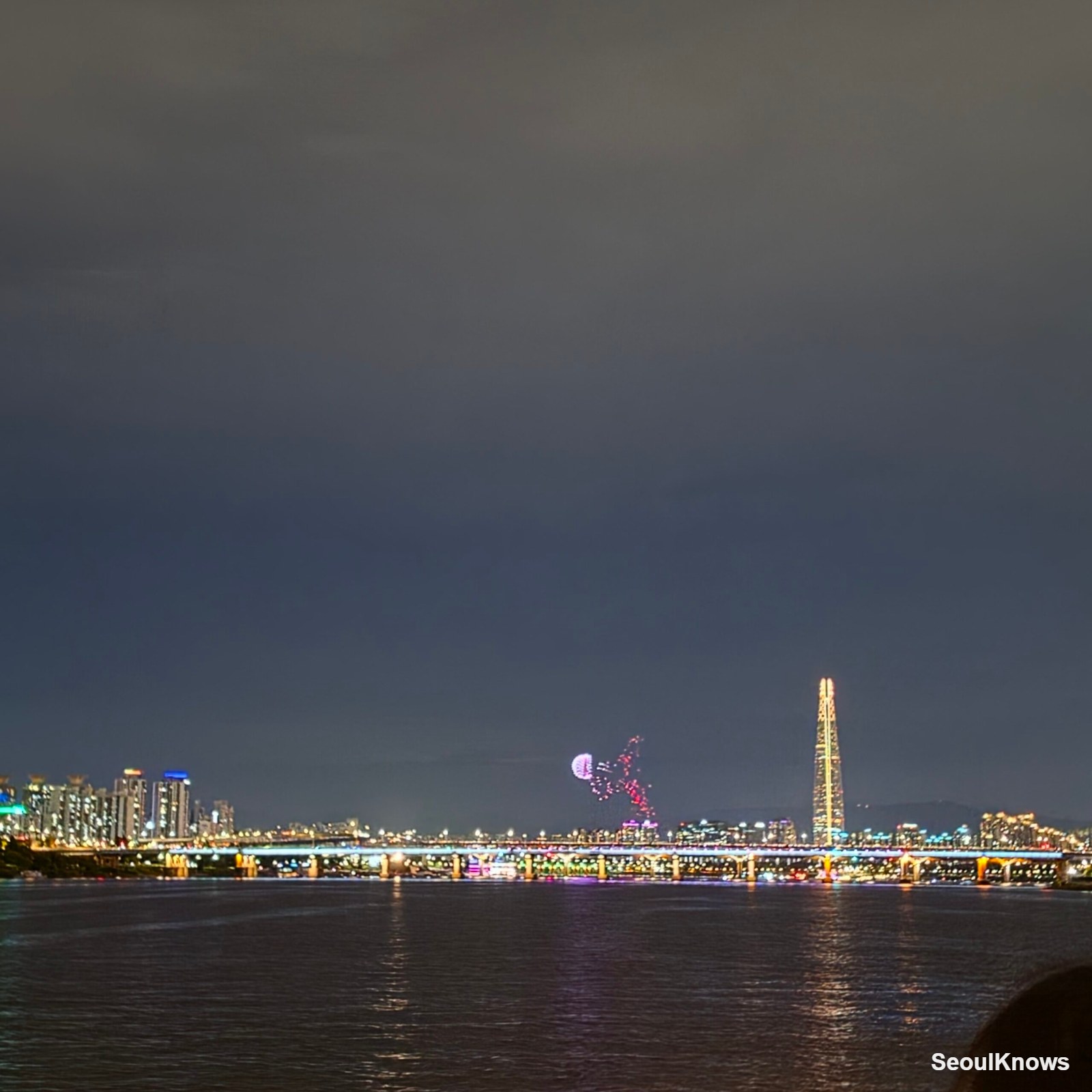 Han River drone show and Lotte World Tower at night