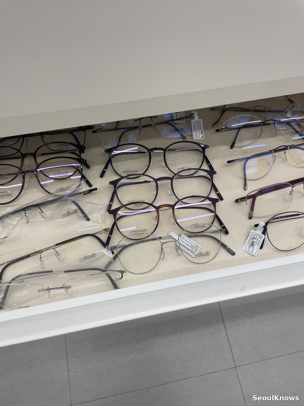 Eyeglass frames displayed on a counter in Seoul