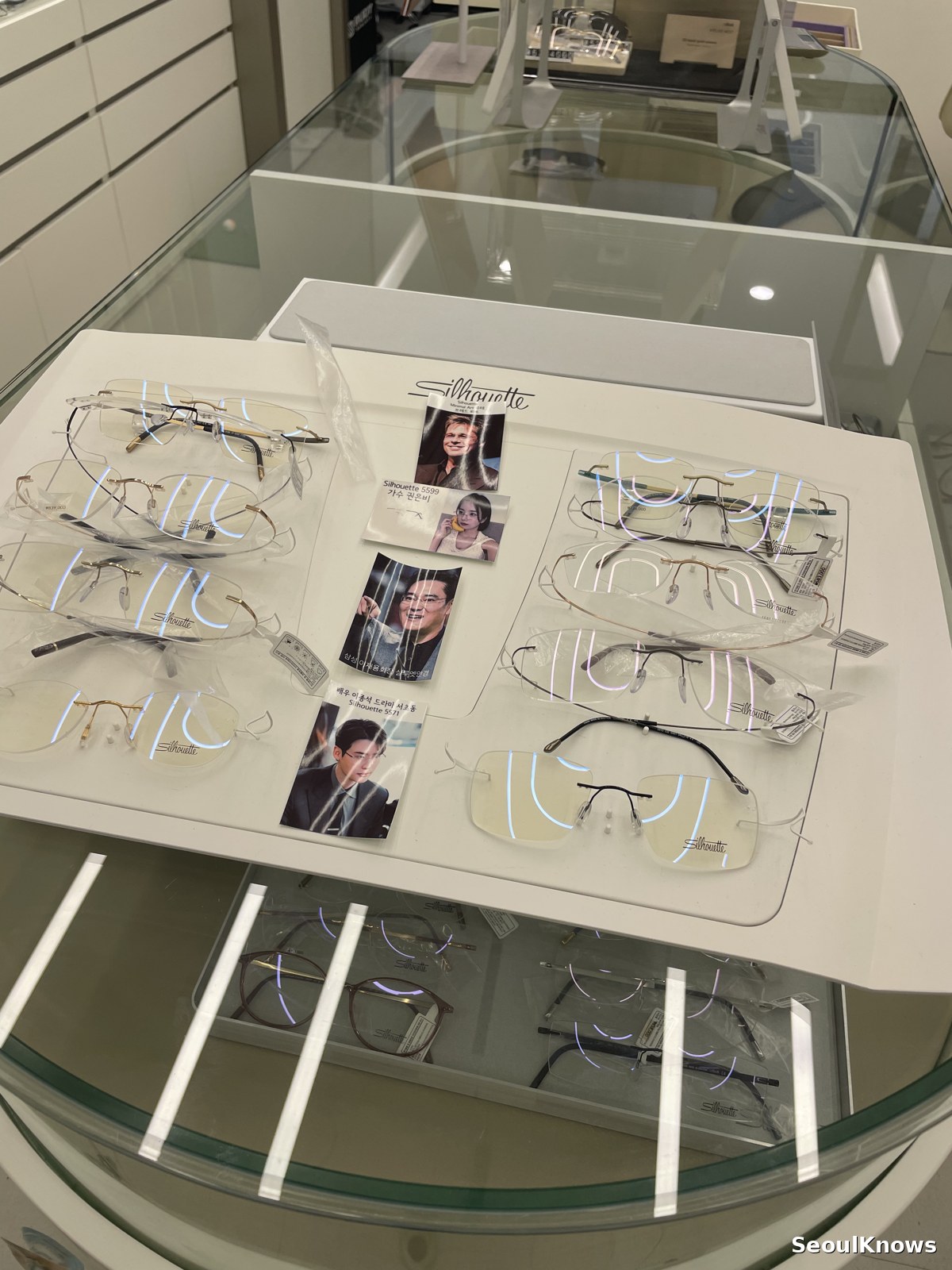 Rows of eyeglass frames on display in a Korean optical shop
