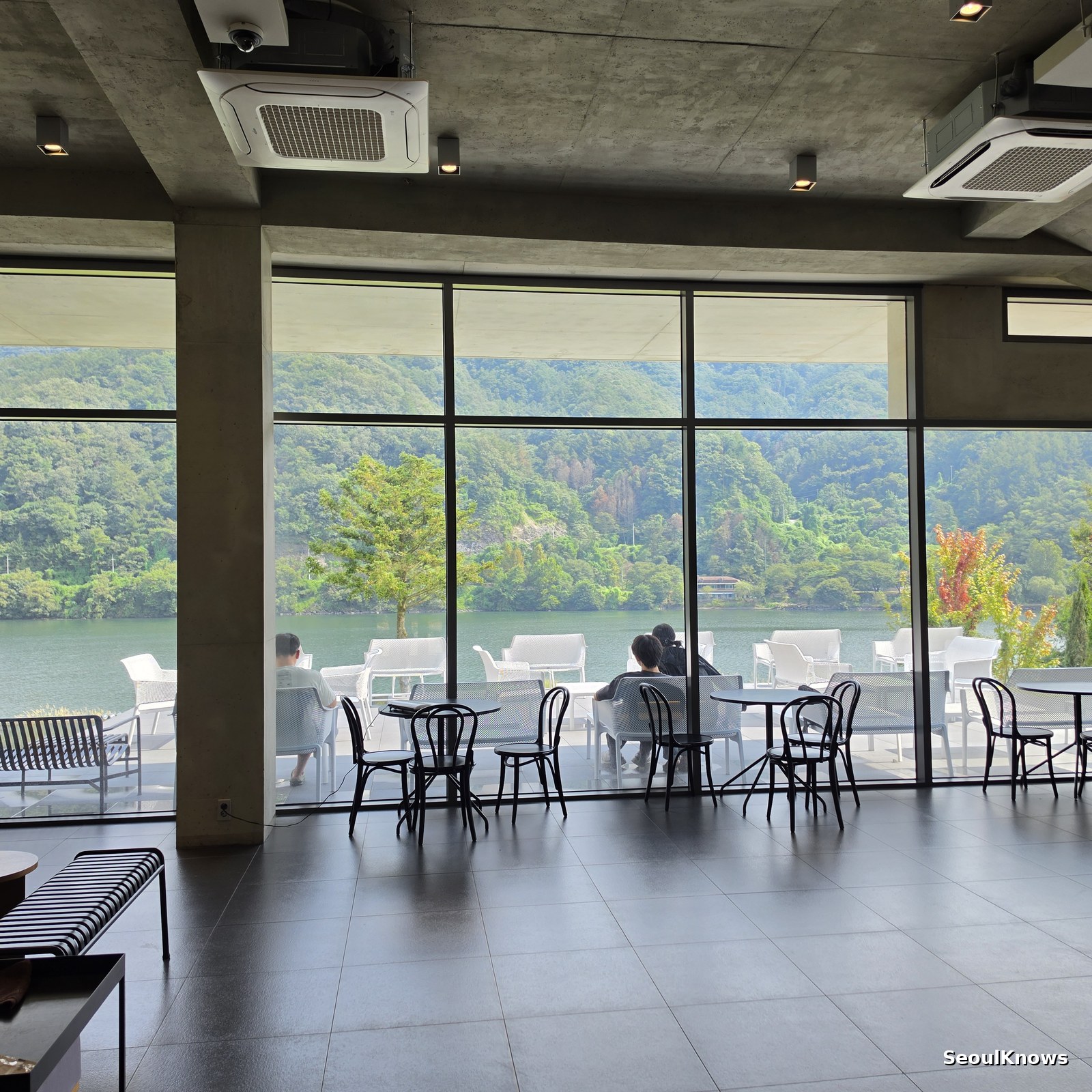 Floor to ceiling windows and river view seating at Golden Tree Gapyeong