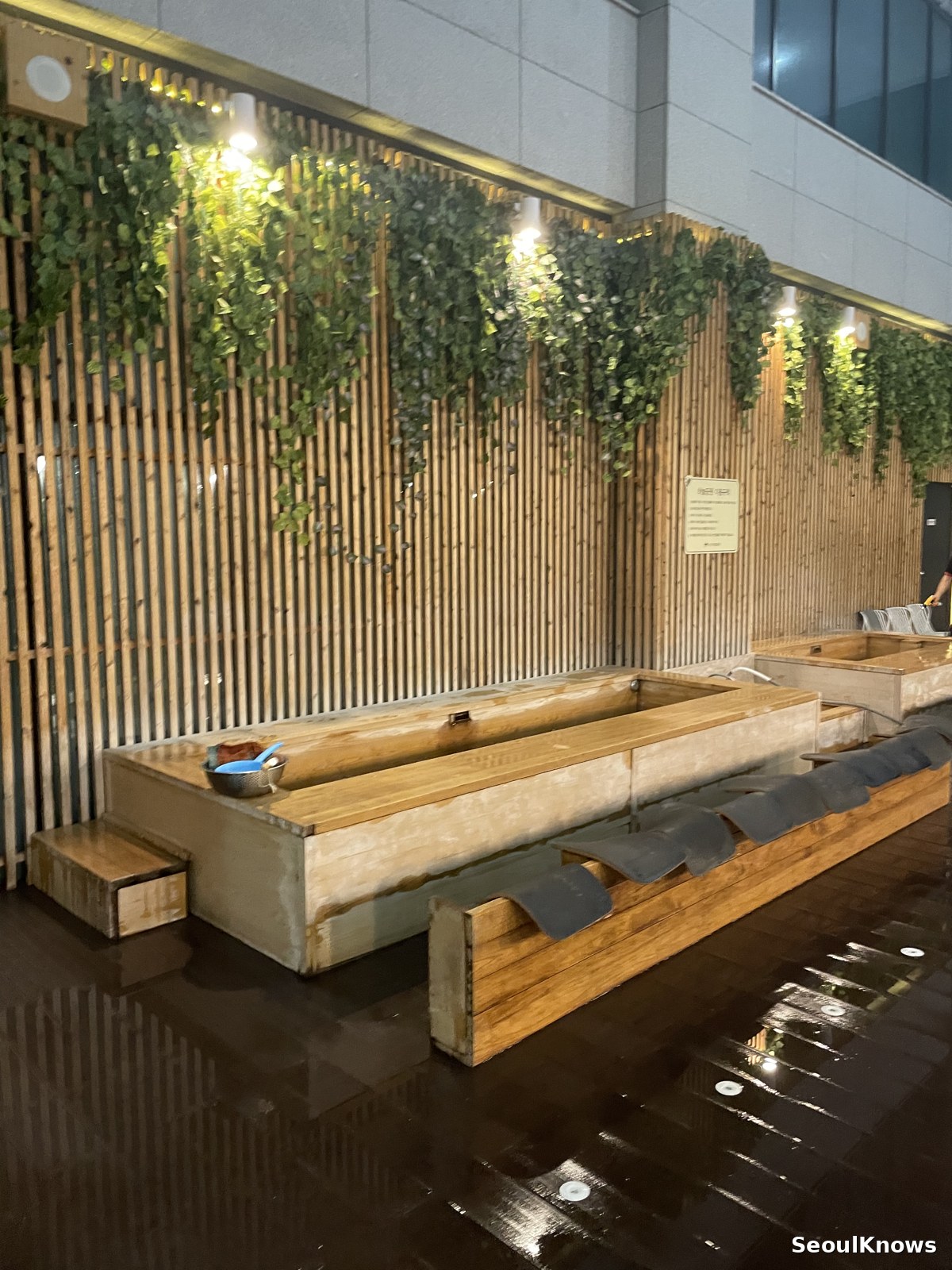 Outdoor foot bath on a rooftop garden at a jjimjilbang