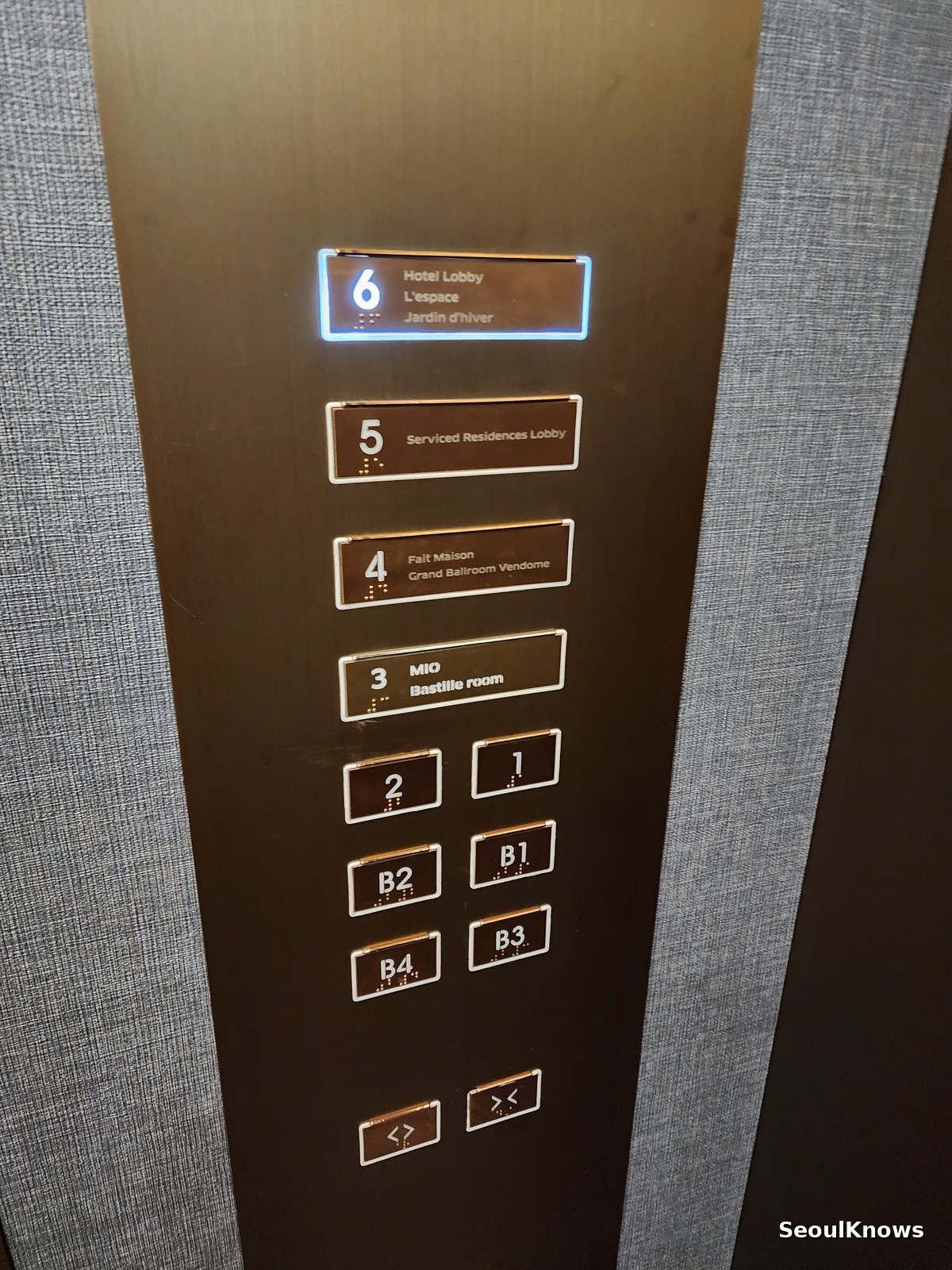Lift panel at Sofitel Ambassador Seoul showing the 6th floor hotel lobby and L'Espace lounge